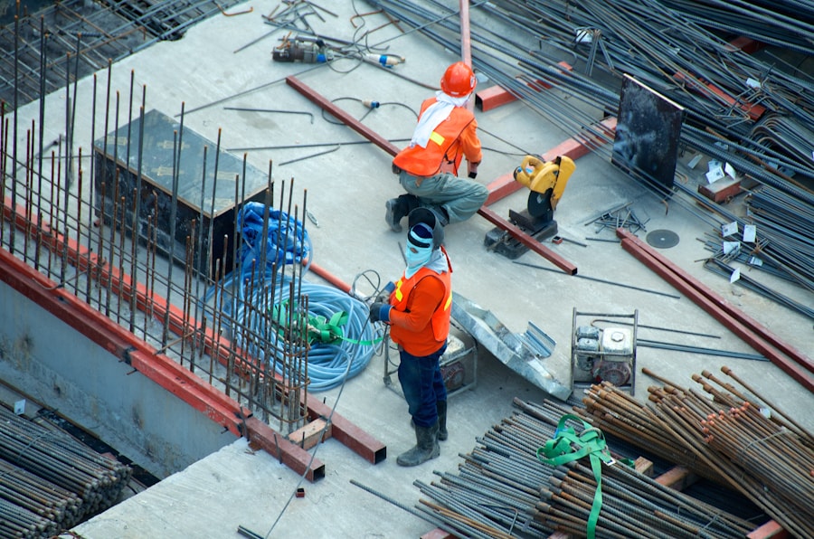 Construction professionals working with technical plans